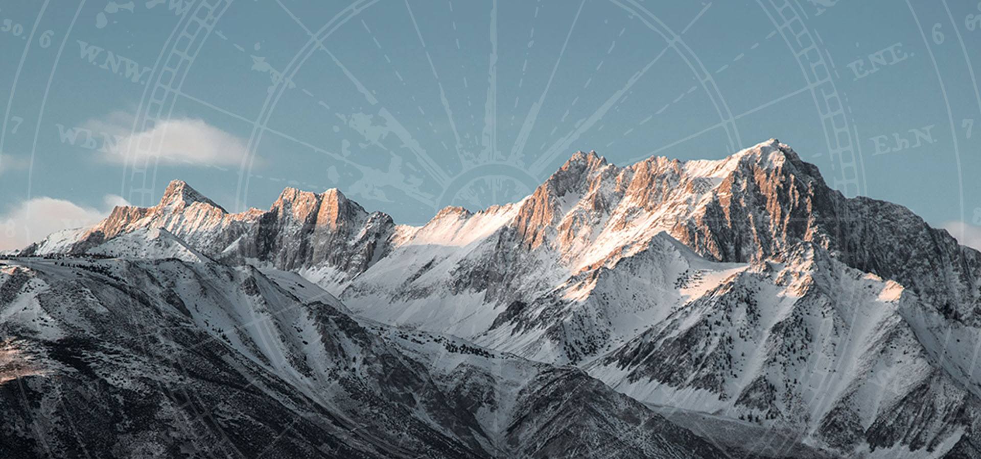 Mountains with compass overlayed