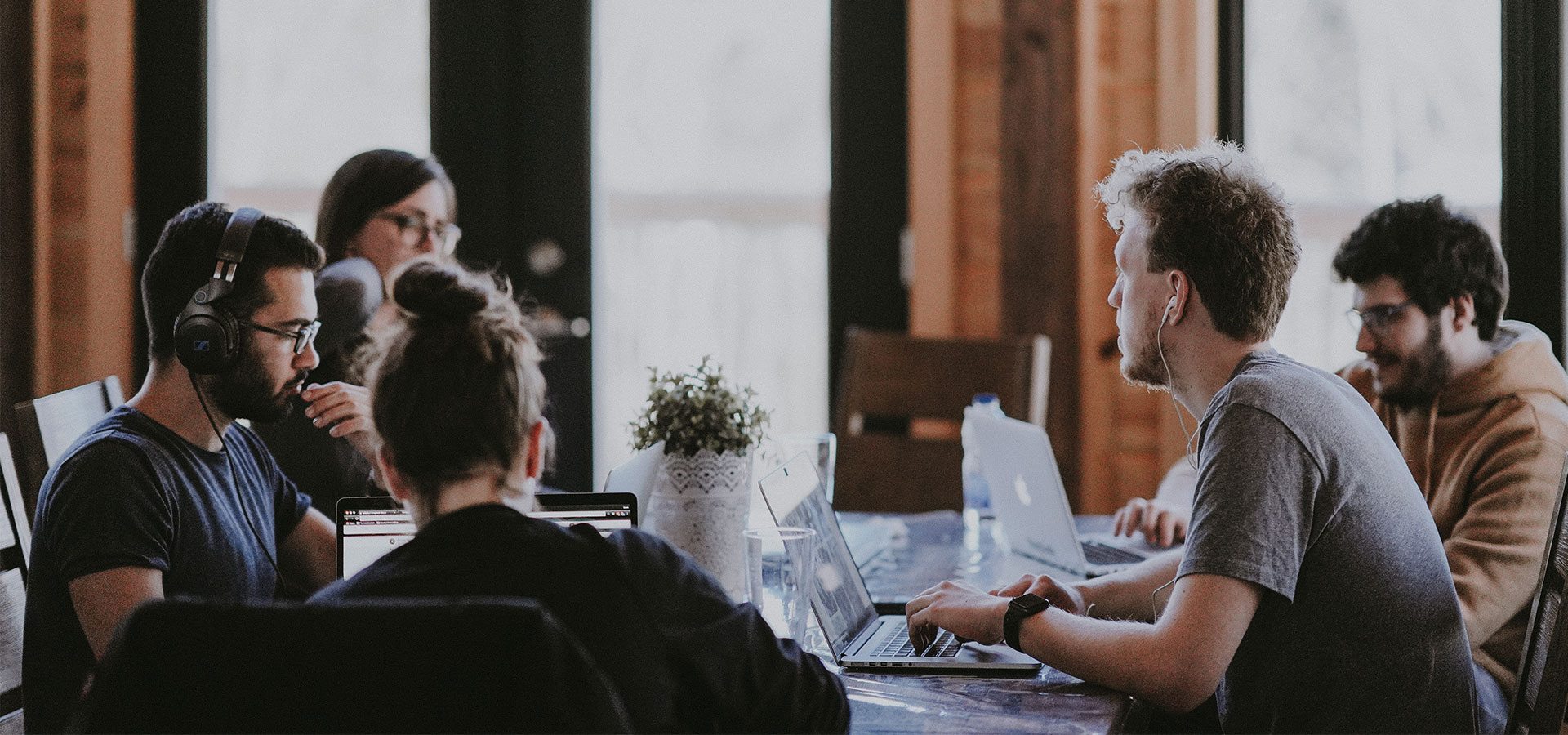 group of people in staff meeting