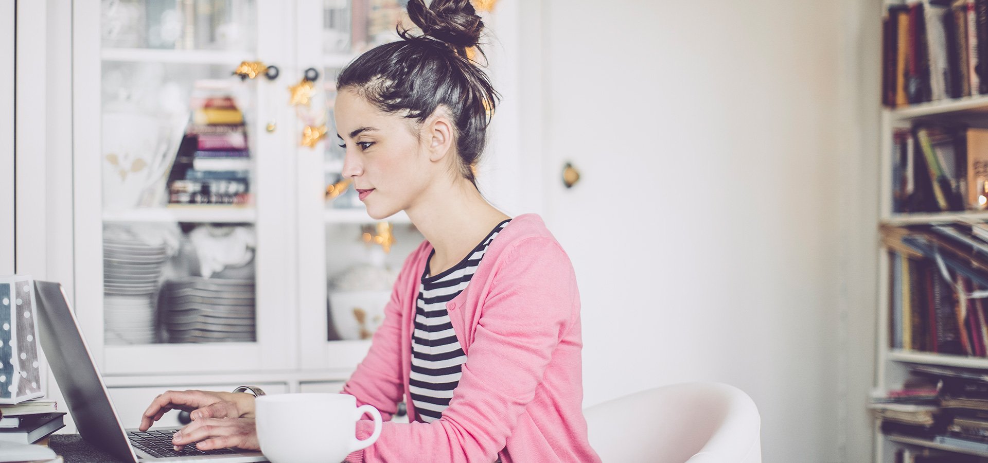 woman working from home on laptop computer