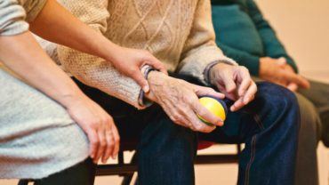 Person holding a stress ball