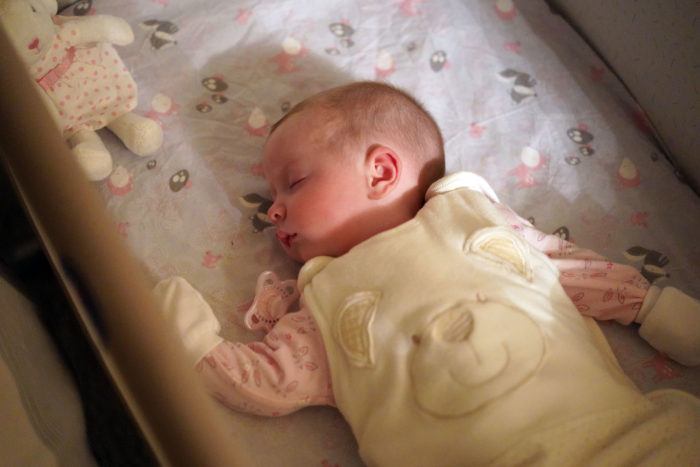 Example of infant in a crib as previously described