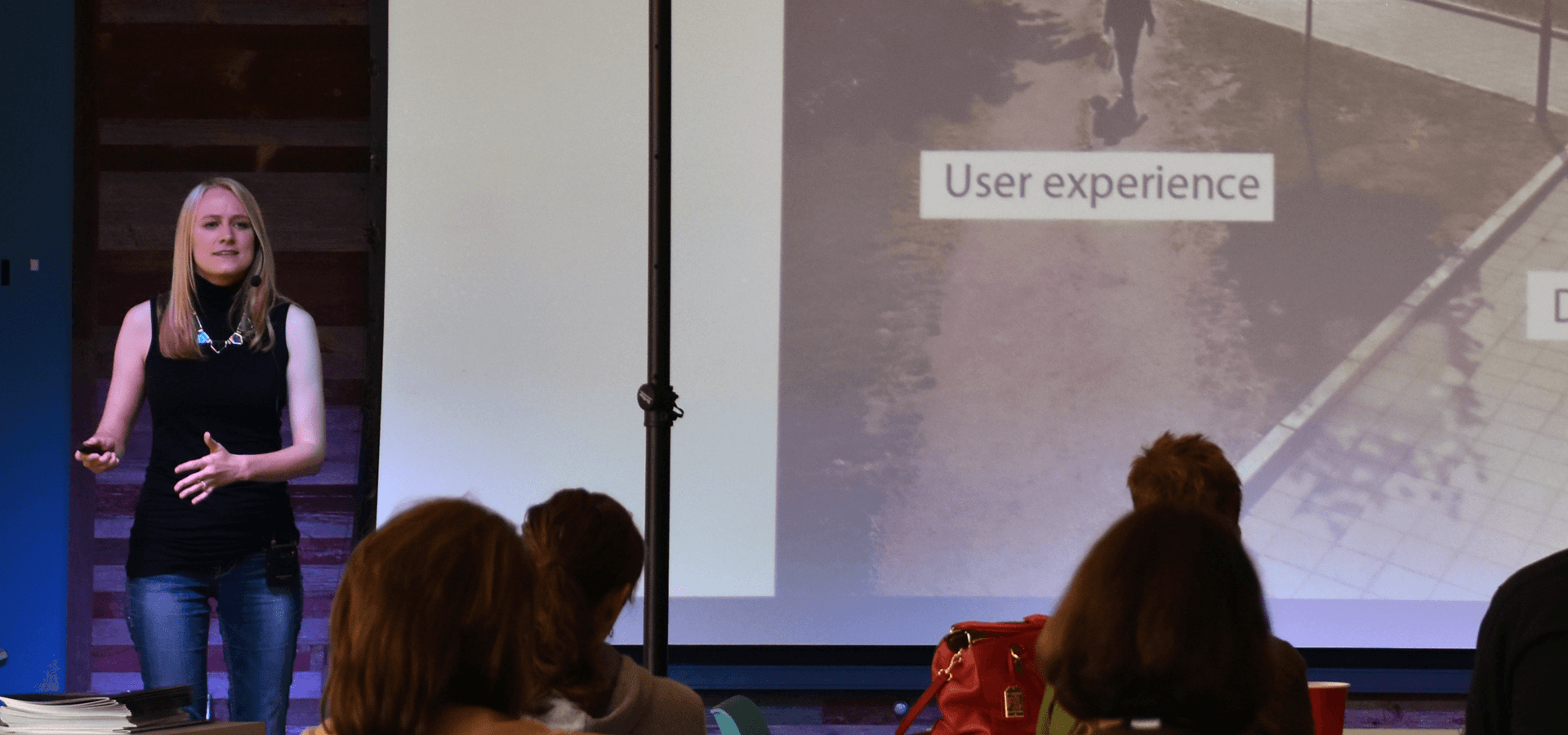 Lindsey Steinkamp giving a presentation at Geonetric Symposium.
