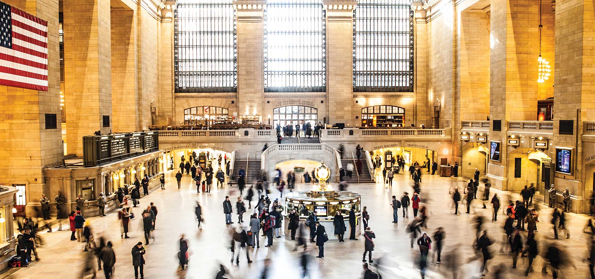 A crowd of people in a trainstation